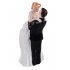  EU Direct  Wedding cake figurines adorn the happy bride and groom