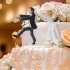  EU Direct  Wedding cake figurines adorn the happy bride and groom