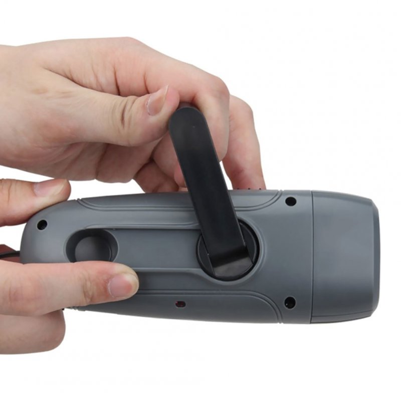 Portable Hand Crank Led Flashlight with Fm Radio Alarm Function Outdoor Emergency Lamp 