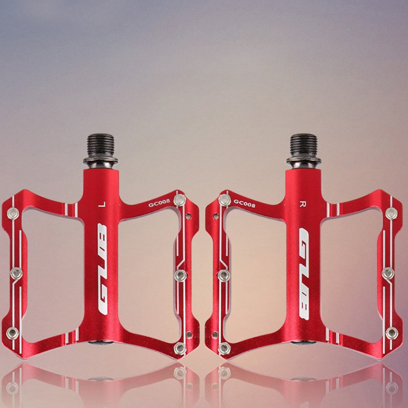 red metal bike pedals