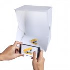 Foldable Photo Studio lets you shoot stunning product pictures with your smartphone  Comes with an ultra bright light and silver interior for minimal shadows 