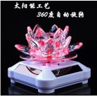 Glass Lotus Ornament with Solar Spin System Light Illuminated Base White background   pink lotus