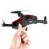 JY018 Folding Drone is an extremely compact and lightweight quad copter that comes with an integrated camera and 100m control distance  