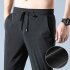 Men Loose Casual Sports Pants Summer Ice Silk Quick drying Air Conditioning Breathable Trousers light grey 3XL
