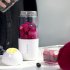Portable Manual Juicer Mini Baby Juice Cup for Lemon Orange Juicing Pink