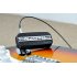 Portable Mini Guitar Amplifier which fits right into your pocket and delivers a clear acoustic sound  straight to your headphones