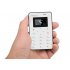 Possibly the Smallest Phone in the World the iNew Mini 1 can easily slip in your wallet or purse and is only the size of a credit card