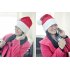 Santa Claus Beanie Hat featuring in built headphones is the ideal festive head accessory to wear to listen to jingle bells when out doing Christmas shopping