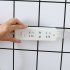 Seamless Punch free Plug Sticker Holder Wall Fixer Power Strip Shelf Wall Holders white