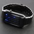 Tap the display button on the right side of the timepiece and watch the screen light up  There are four columns of lights  The first two columns represent hours