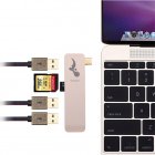 This USB C hub lets you transfer files in between all your electronics thanks to its USB 3 0  SD card  and Micro SD card slots  