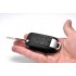 This covert  camera is disguised as a standard car key   alarm remote for your keychain  It features a virtually undetectable pinhole lens and    