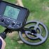 Underground metal detector with 3 8 inch LCD screen 12 inch diameter coil  a 2 5 meter detection depth  sensitivity adjustment and light weight design
